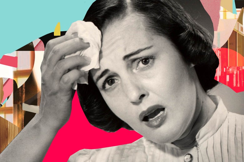 Worried woman wiping brow.